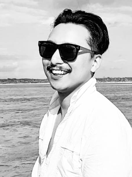 Portrait of Han Lee by the water